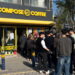 Customers line up outside a Compose Coffee location.